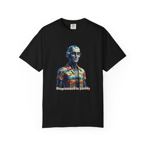 May include: Black t-shirt featuring a robot illustration wearing a colorful Hawaiian shirt and glasses. The robot has a metallic head and torso. The text "Programmed to parody" is below the robot. The shirt is a casual wear item.