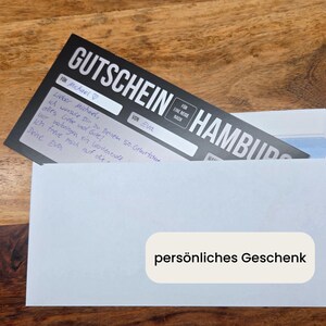 persönliches Reisegutschein nach Hamburg mit Vorder- und Rückseite