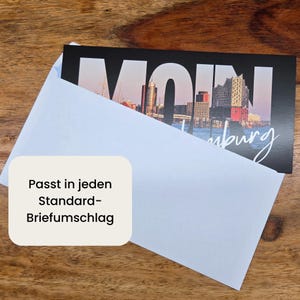 Gedruckter Reisegutschein Hamburg mit Vorder- und Rückseite