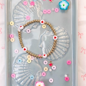 red hearts bracelet