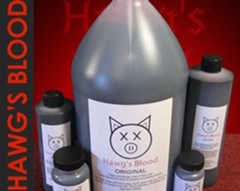 May include: Four bottles of Hawg's Blood Original fake blood in various sizes. The largest bottle is a gallon size and the smallest is a 2 ounce bottle. The bottles are all black and have a white label with a pig's head and crossbones on it.