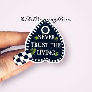 Planchette shaped phone grip