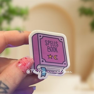 Spell book phone grip