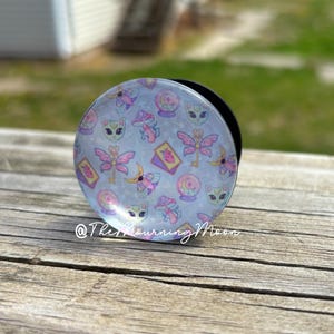 Spooky cute glass dome phone grip