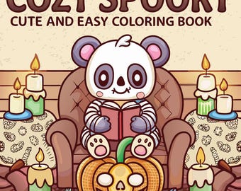 May include: A cartoon illustration of a panda reading a book, seated on a brown armchair atop a jack-o'-lantern. The image is surrounded by lit candles and pumpkins, with the text "COZY SPOOKY CUTE AND EASY COLORING BOOK" at the top.