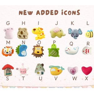 May include: A collection of small, colourful, plush-like decorative icons arranged in a grid labelled with letters G through X. The icons feature various shapes including animals, a mushroom house, a helicopter, and hearts, with the text NEW ADDED ICONS.