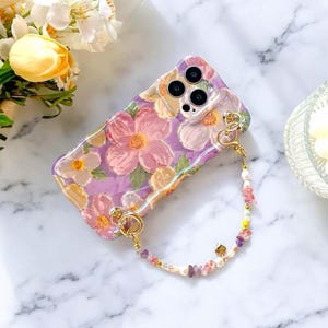 Coque pour iPhone 16 15 14 13 12 11 Plus, peinture à l'huile rétro avec bordure florale brillante, avec bracelet en chaîne, coque esthétique pour iPhone 16 15 14 13 12 11 Plus
