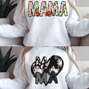 Peut inclure: Sweat-shirt blanc avec le mot "MAMA" en deux motifs. Le motif supérieur présente "MAMA" rempli de fleurs colorées. Le motif inférieur présente "MAMA" en motifs noir et blanc à l'intérieur d'un cœur.
