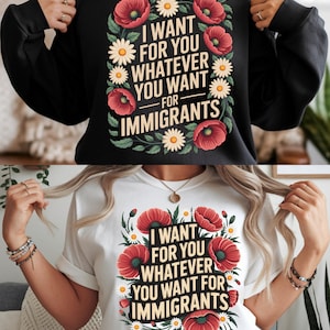 以下が含まれることがあります： 赤いポピー、白いデイジー、緑の葉で囲まれた「I WANT FOR YOU WHATEVER YOU WANT FOR IMMIGRANTS」というテキストがプリントされた黒いスウェットシャツと白いTシャツ。スウェットシャツは長袖です。