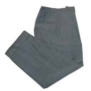 May include: Gray pleated pants with a single back pocket.