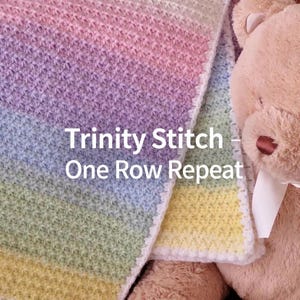Manta de bebé tejida a crochet con punto trinidad - Patrón fácil