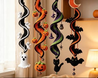 May include: Four hanging crochet spiral decorations featuring Halloween themes. One spiral has white ghosts, one has orange pumpkins, one has a black cat and witch hats, and one has black bats with an orange crescent moon topper. Text reads: Halloween Crochet Spiral DIY Kit & Tutorial.