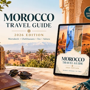 Op de afbeelding: Een digitaal e-book getiteld Morocco Travel Guide 2026 Edition, met afbeeldingen van Marrakech, Chefchaouen, Fes en de Sahara. De cover toont de titel in donkerblauwe tekst, met een gouden embleem en een ronde Digital Ebook-badge.