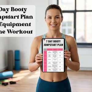 May include: A woman holds a tablet displaying a workout plan. The tablet reads "7 Day Booty Jumpstart Plan No Equipment Home Workout." The plan is outlined in pink and white. Exercise equipment, including a yoga mat, is visible in the background.