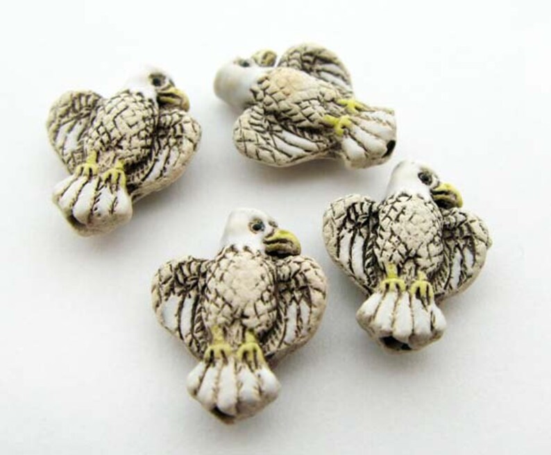 20 Tiny Eagle Beads tan CB87 | Etsy