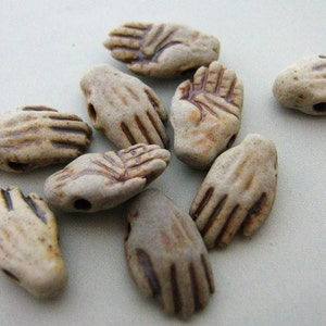 4 Tiny Hand Beads - CB566