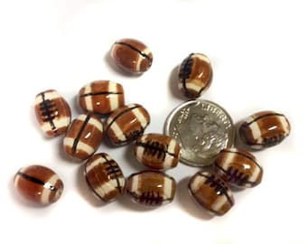 20 small football Beads