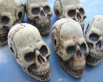 4 Large High Fired Skull Beads - long jaw - HIFI192