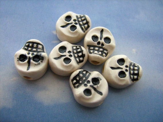 Flat on sale skull beads
