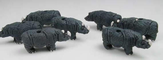 10 Antique gold plated pewter Rhinoceros African beads Rhino Beads 10 Antique gold plated pewter Rhinoceros African beads Rhino Beads