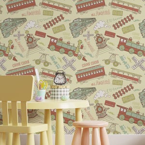 May include: A playful wallpaper design with a repeating pattern of vintage trains, carriages, railway crossings, and windmills in red, green, and brown on a cream backdrop. The scene includes a child's table, chairs, and toys.