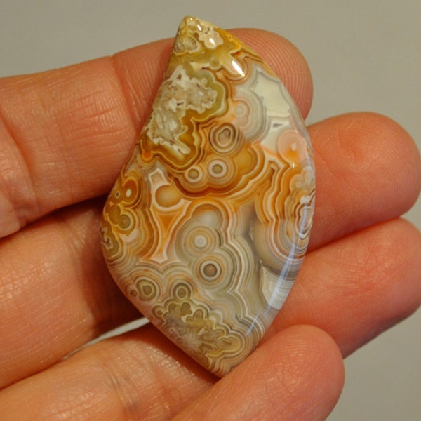 Crazy Lace agate cabochon - Top shelf orb structures