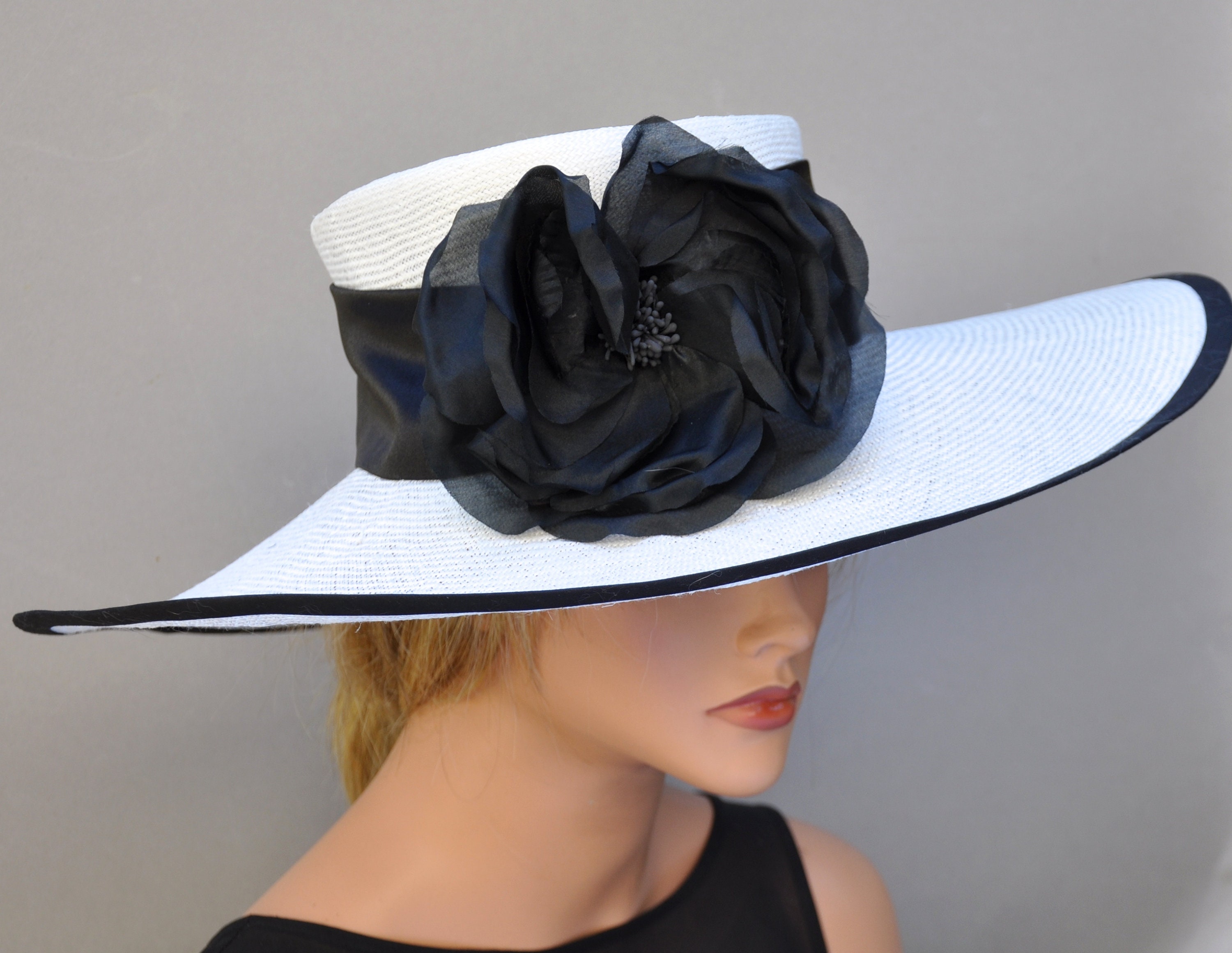 Танцевальная шляпа. Черная шляпка женская. Черная женская шляпа. Черные элегантные шляпки. Широкополая черная шляпа.