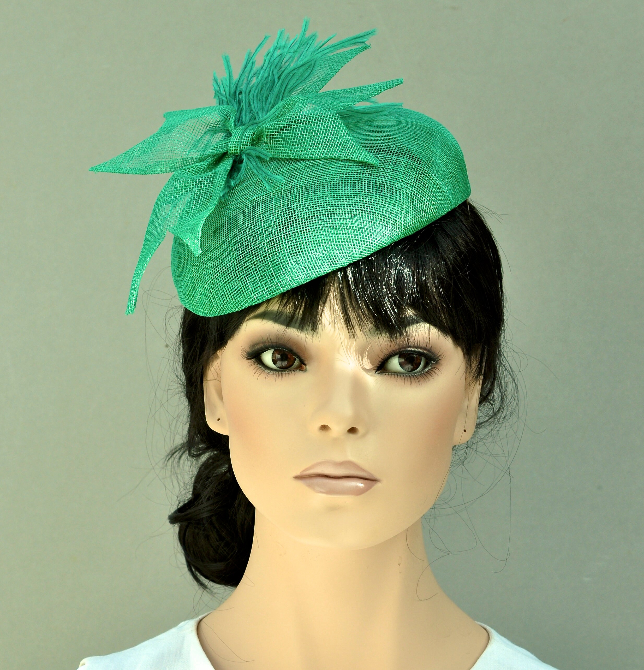 green pillbox hat