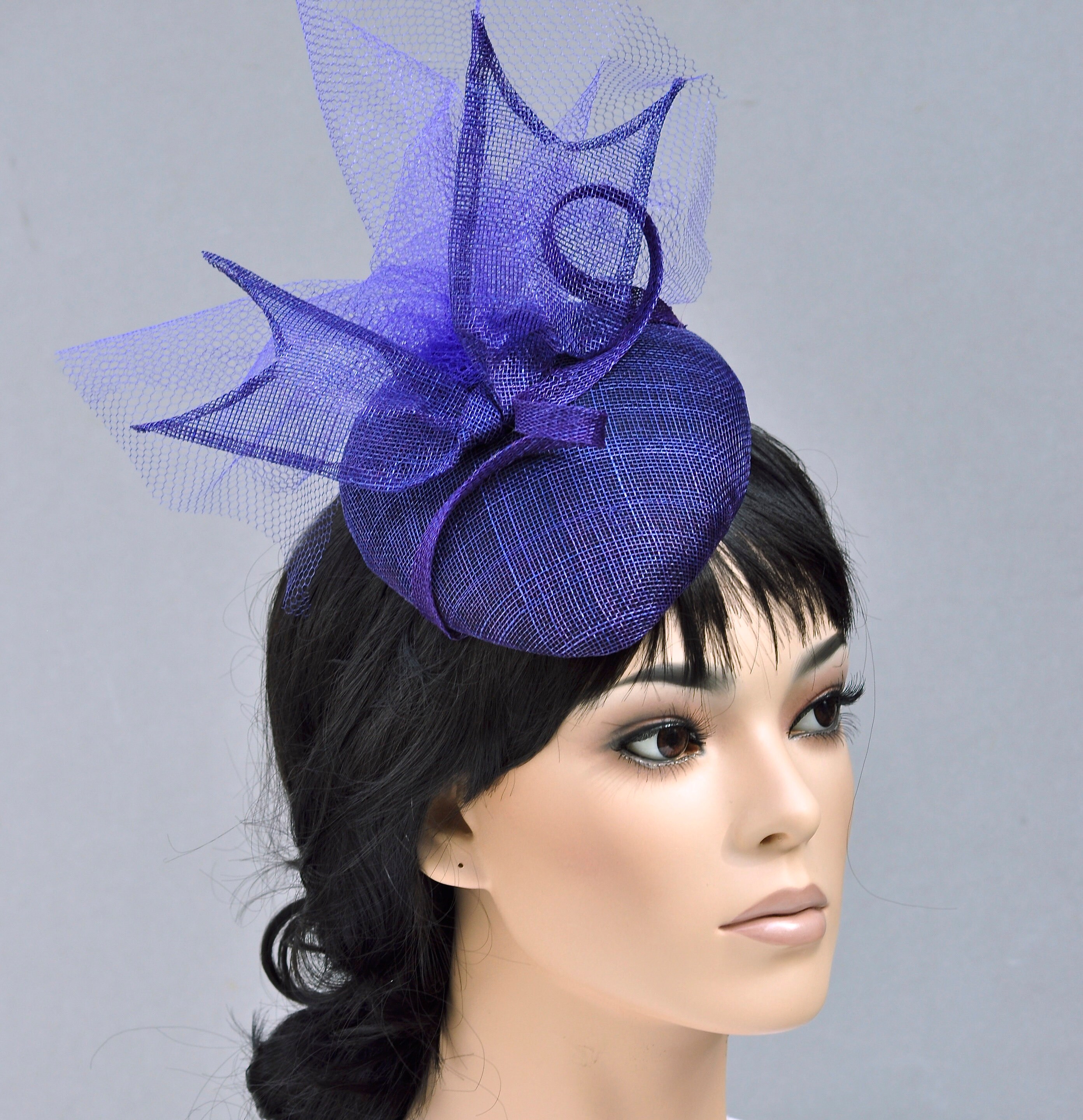 purple wedding hats and fascinators
