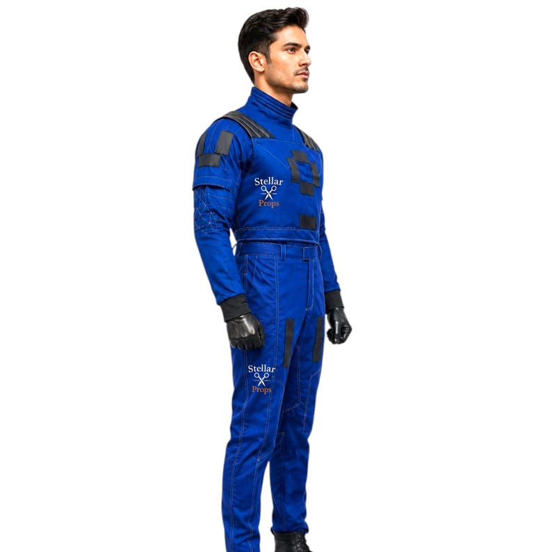 May include: A vibrant blue jumpsuit with black accents, featuring a high collar and long sleeves. The outfit includes black gloves and is branded with the text "Stellar Props". This costume is suitable for cosplay or themed events.