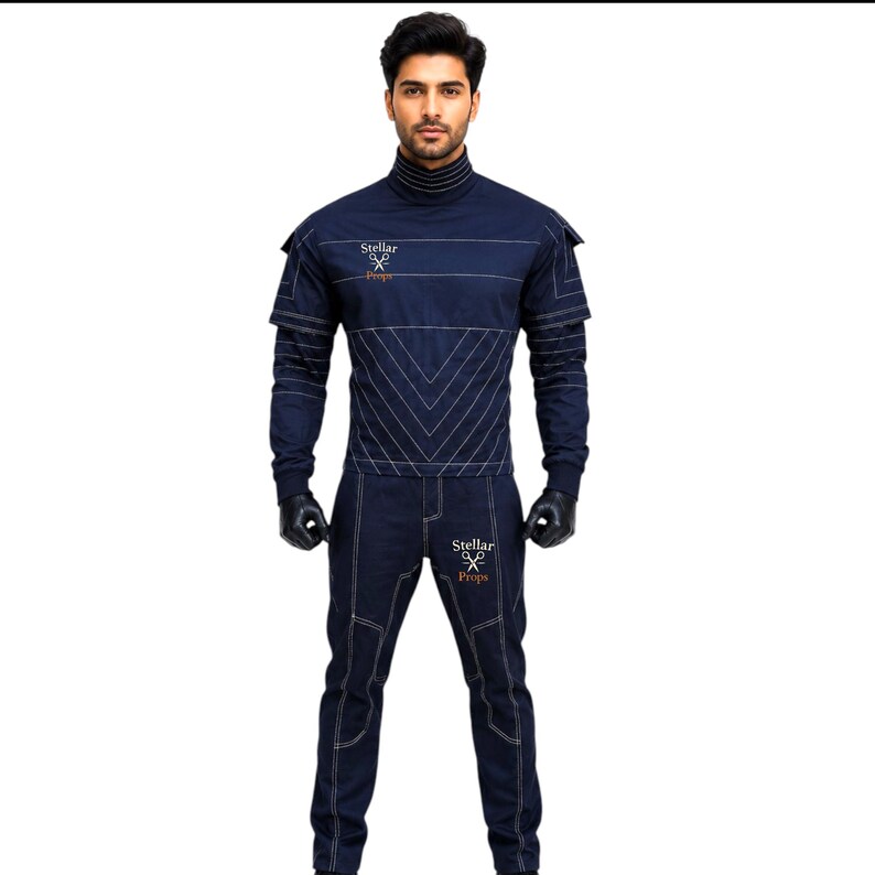 May include: A dark blue jumpsuit with white stitching details and the text "Stellar Props". The outfit features a high collar, long sleeves, and matching pants. Black gloves complete the look. The design has a futuristic or sci-fi aesthetic.