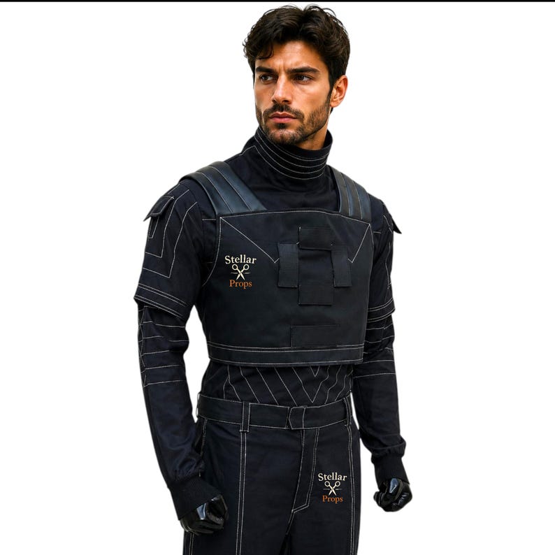 May include: Black costume with white stitching, featuring a high collar and a cropped vest with leather accents. The text "Stellar Props" is visible on the vest and pants. The outfit includes gloves and pants.
