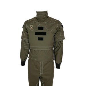 May include: Olive green jumpsuit with white stitching details, a high collar, and black accents. The suit features the text "Stellar" and a logo on the chest. The sleeves have black cuffs.