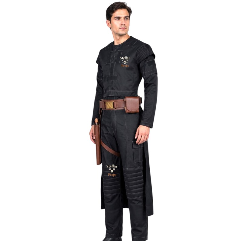 May include: Black costume with a long-sleeved jacket, pants, and a brown belt with a pouch. The costume includes a holster and the text "Stellar Props". The jacket has padded shoulders and the pants have knee padding. The costume is designed for cosplay or costume events.