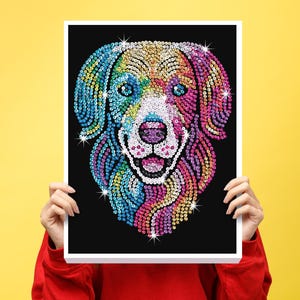 May include: A colorful dog portrait made of sparkling sequins on a black background. The dog's face features a rainbow of colors, including blue, green, yellow, pink, and purple. The artwork is held up against a yellow background.