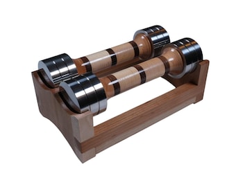 1.9 kg dumbbells with walnut, spruce and Pacific Coast maple handles, stainless steel weights and solid cherry support.