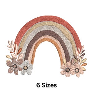 May include: Embroidered rainbow design in shades of rust, tan, brown, and cream, with floral accents. The image features a stylized rainbow with six color bands and decorative flowers. Text at the bottom reads "6 Sizes".