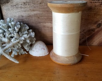 Vintage Best-By-Test Wooden Spool with Bookbinding Thread Some thread remaining H.E. Locke and Co Lincoln