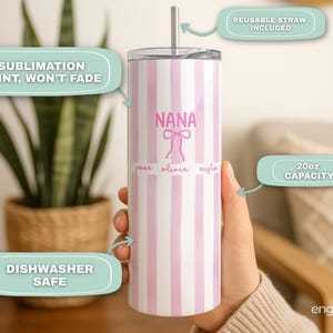 May include: A white and pink striped tumbler with the word "NANA" and a bow graphic. The tumbler includes a reusable straw and has a 20oz capacity. The text "Sublimation print, won't fade" and "Dishwasher safe" are also visible.