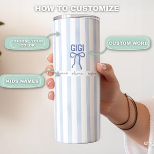 May include: A personalized tumbler with a light blue and white striped pattern. The tumbler features the name "GIGI" with a bow design, and the names "jeune olivia eustin" below. The text "HOW TO CUSTOMIZE", "CHOOSE YOUR COLOR", "CUSTOM WORD", and "KIDS NAMES" are also visible.