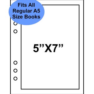 May include: A rectangular white page insert with a black border and five circular punch holes along the left side. The text 5"X7" is centered, and a blue oval contains the text Fits All Regular A5 Size Books in black lettering.