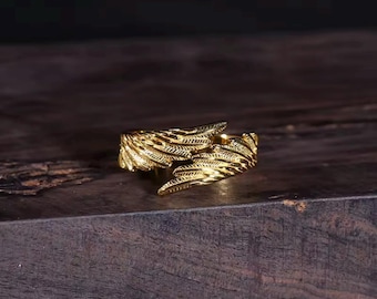 Anillo de ala dorada