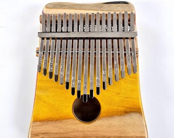 Kalimba, piano de pulgar exótico hecho a mano con patineta reciclada y diseño personalizado.