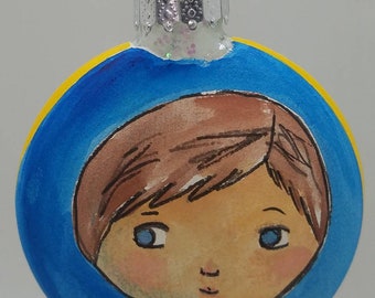 Little Boy in a Striped Shirt Painted Glass Christmas Ornament.