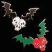 Jolene Anderson reviewed Holly and Ivy Skull and Bats Gothic Christmas Halloween Enamel Pin