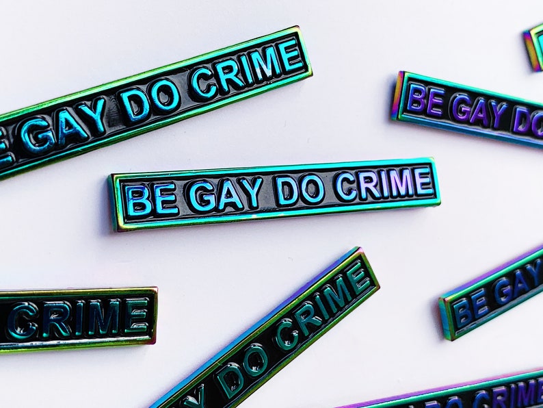 Be Gay Do Crime Enamel Pin Rainbow Anodized Metal Text image 1