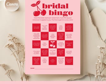 May include: A pink bridal bingo game card with red text and cherry graphics. The card includes statements for guests to mark, with the text "bridal bingo" at the top and "20 bridal shower games" at the bottom.