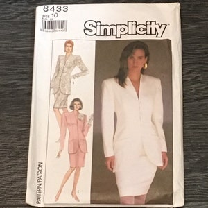 May include: Simplicity sewing pattern number 8433, size 10, for a white suit with a jacket and skirt. The pattern includes two different styles, one with a more fitted jacket and the other with a more relaxed fit.