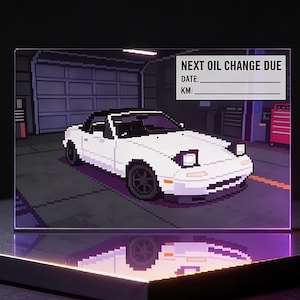 Op de afbeelding: Witte keramische mok met een zwarte handgreep en de tekst "But First, Coffee" in een zwarte, handgeschreven lettertype. De mok is geschikt voor warme dranken en bevat ongeveer 310-425 ml.