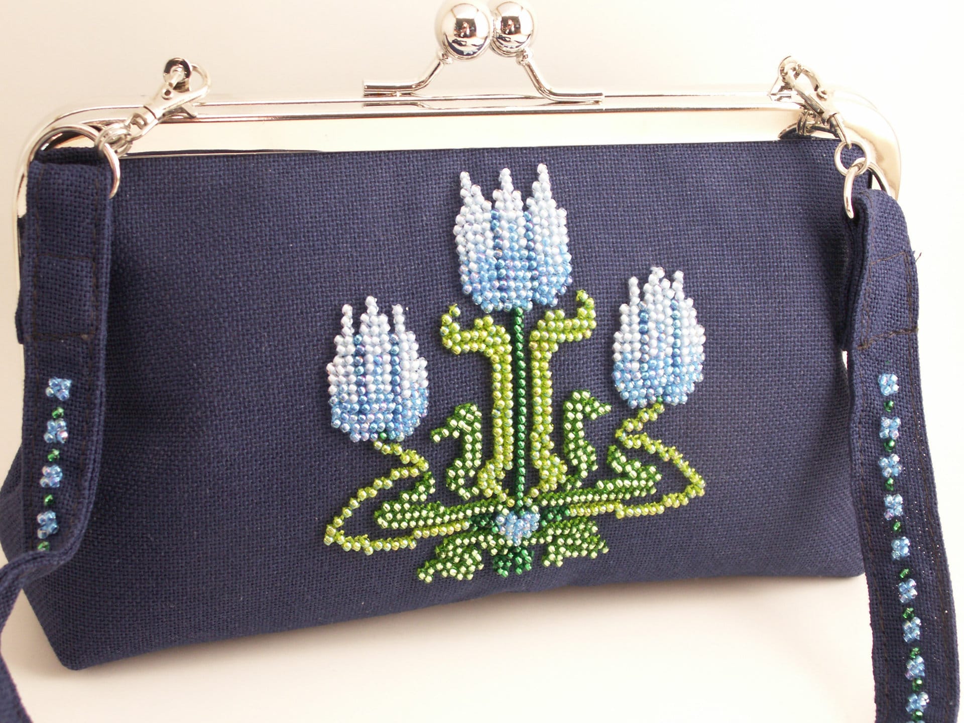 navy blue beaded clutch bag